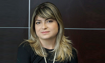 Juliana: reduzir exposição em ativos menos líquidos